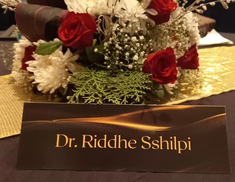 Dr. Riddhe Sshilpi name plate at an event