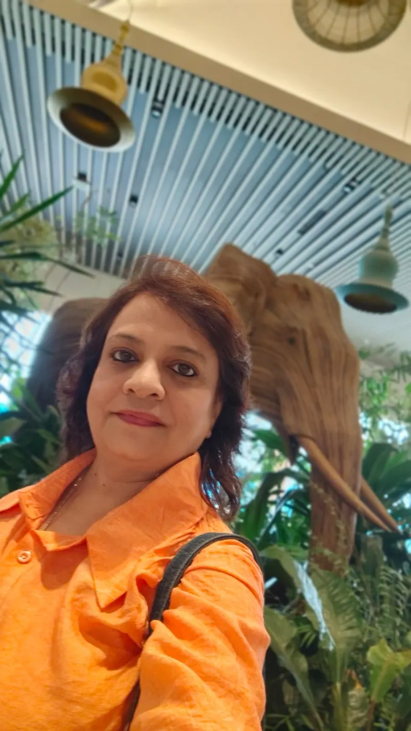 Dr. Riddhe Sshilpi arriving at Kempegowda International Airport, Bengaluru, for a Vastu site visit