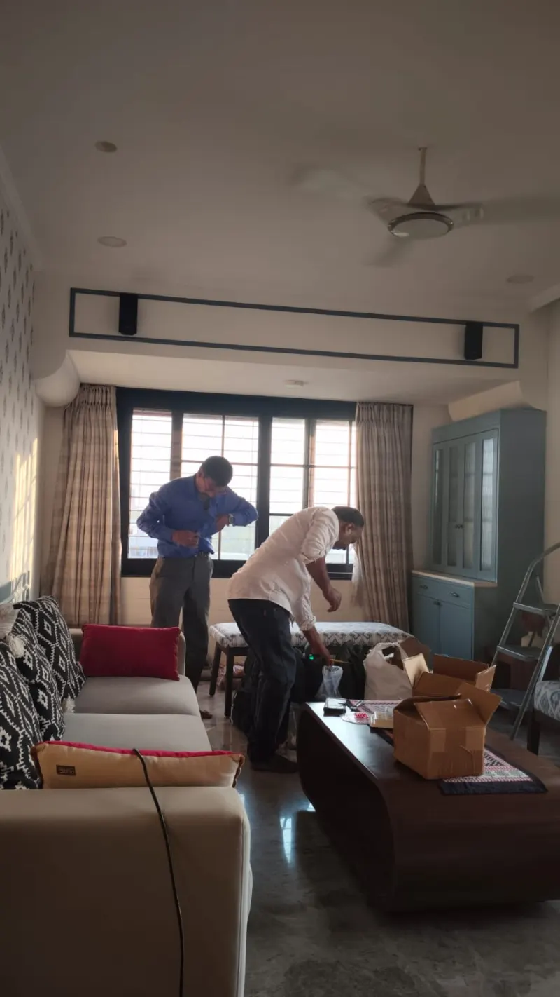 Vastu remedies being installed in the living room of an Andheri apartment