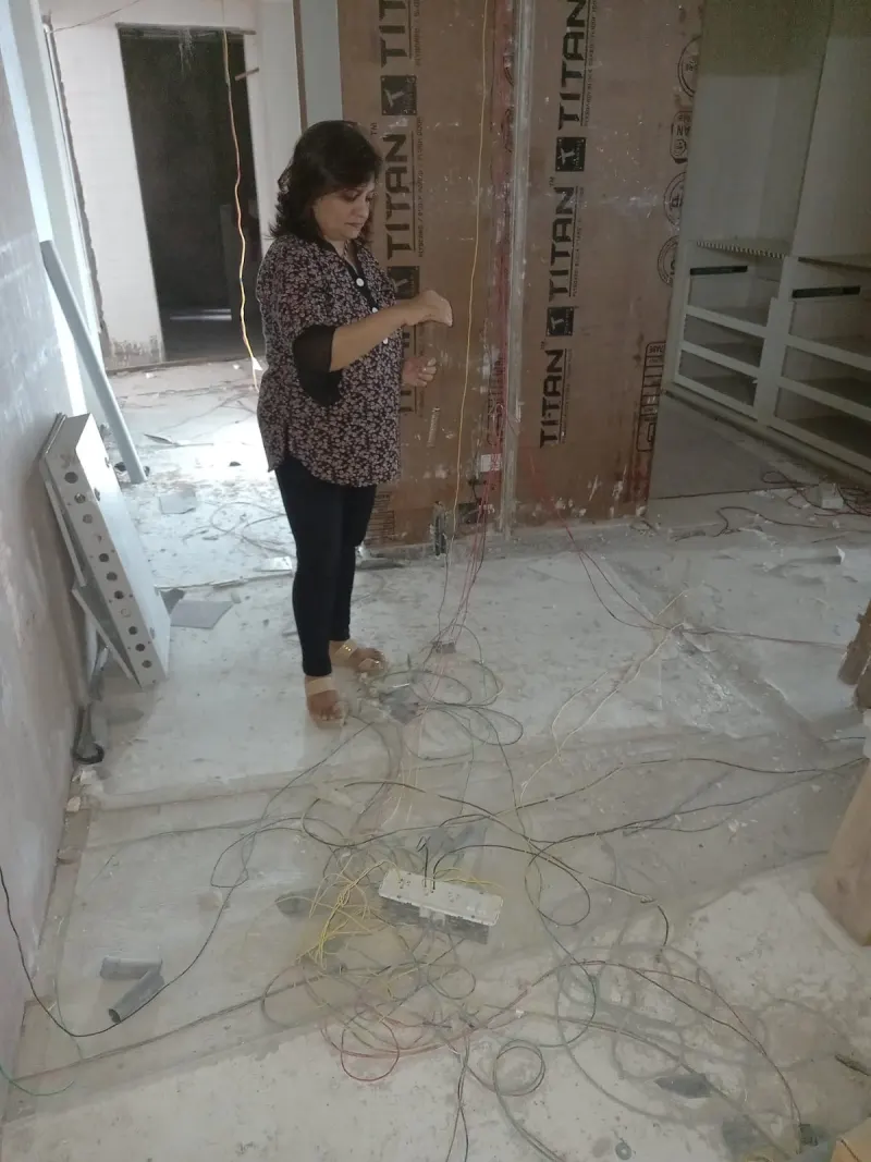Vastu direction check near the entrance of the Versova site